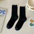 Solid color black ribbed crew socks for women, versatile cotton mid-calf daily wear. - One Size / Black