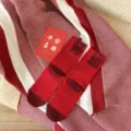 Red mid-tube socks for Chinese New Year, festive cotton hosiery with lucky 3D text. - Good Luck (Red)