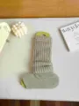 Cozy knit foot stirrup leg warmers for women, warm winter casual solid color sock sleeves. - One Size / Khaki