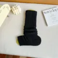 Black knit stirrup leg warmers for women, autumn winter cozy slouch socks for boots. - One Size / Black