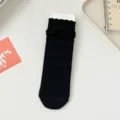 Black ribbed wool slouch socks for women, warm winter mid-tube socks with delicate lace cuffs. - One Size / Black