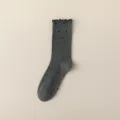 Women's grey cotton mid-tube socks with cute ruffled cuffs and classic black polka dot pattern. - Lettuce Edge Dark Gray