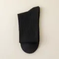 Classic black ribbed men's socks, comfortable cotton casual wear for autumn and winter season. - One Size / Black