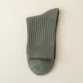 Men solid dark green ribbed crew socks, classic casual business cotton socks main view. - One Size / Wood Green