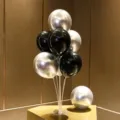 Black and silver balloon table stand detail showing metallic balloons and clear stand parts. - Table Float 92 (Black Silver Combo) / Table Stand + Balloon Combo