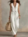 Details of the chic V-neck linen sleeveless jumpsuit with a bow waist and wide leg. - S / Jumpsuits / White