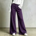 Detail view of casual waffle knit wide-leg pants in purple, featuring a relaxed straight fit. - Purple