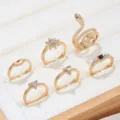 Set de anillos de moda con serpiente y flor en circonita dorada, joyería de tendencia. - Serie Ojo del Diablo Serpentino (6 Piezas)