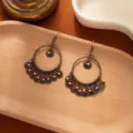 Retro bohemian antique copper drop earrings featuring carved circular charms and beads. - Large Hoop Double Layer Carved Drop (E2186)