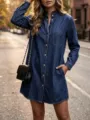 Detailed shot of women's autumn denim shirt dress with ruffled mock neck, long sleeves, and pockets. - S / Dresses / Blue