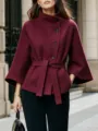 Burgundy wool blend coat with asymmetric button closure, stand collar, and bell sleeves. - S / Tops / Burgundy