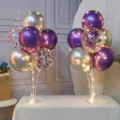 Birthday party balloon table stand set with purple, silver, and confetti balloons, lights. - 6 Metallic Purple + 6 Metallic Silver + 6 Sequin Purple + 2 Stands + 2 LED Lights + Pump
