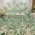 Clear transparent latex balloons filled with green confetti for party and wedding decoration. - 10 Pieces/Pack / Green