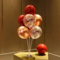 Balloon table stand kit with red, rose gold metallic and confetti balloons for birthday party decor. - Table Float 113 (Ruby Rose Gold Sequin Combo) / Table Stand + Balloon Combo
