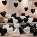 Black and white heart shaped latex balloons set with ribbon and pump for party decor. - Black White Heart Balloons 50 Pcs