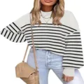 Close-up detail of the black and white striped balloon sleeve knitted sweater texture. - S / White