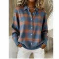 Detail view of the blue and orange plaid knitted sweater showing texture and lapel collar style. - S / Tops / Rice Mist Blue