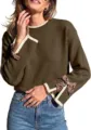 Detailed view of women's round neck sweater featuring contrast ribbed cuffs and cute leopard bows. - Dark Coffee