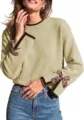 Women's crewneck long sleeve knit sweater with contrast trim and leopard bow close up. - Matcha Green