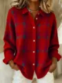 Detail view of women's red plaid knit cardigan featuring lapel collar and white buttons. - S / Tops / Bright Red