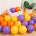 Colorful latex balloons set in purple, orange and yellow for party decoration and celebration. - 10" / Orange & Lemon Yellow & Purple