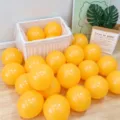 Orange latex balloons for birthday party decoration and holiday celebration setup. - 10" / Lemon Yellow