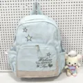 Zaino scolastico azzurro chiaro con ricamo di stelle, tasca frontale e pratici scomparti laterali. - Blu Borsa Singola / Blu