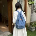 Zaino in denim lavato vintage per uomo e donna, borsa da scuola casual di grande capacità. - Azzurro