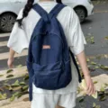 Zaino in denim lavato vintage per donna e uomo, borsa da scuola casual di grande capacità blu. - Blu scuro