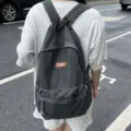 Zaino in denim lavato vintage per donne e uomini, grande borsa per la scuola casual. - Grigio