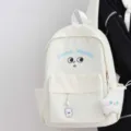 Cute white school backpack detail featuring blue Always Wonder embroidery and soft star plush charm. - With Moon Charm / White