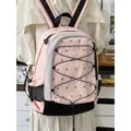 Zaino rosa a pois con coulisse e tasche laterali in rete per studenti e pendolari urbani. - Taglia L / Rosa