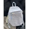 Zaino a pois azzurro chiaro con tasca frontale trasparente e ali carine per uso quotidiano. - Grande + Piccole Ali / Blu