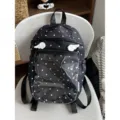 Pratico zaino nero a pois bianchi con grande tasca trasparente e bellissime ali d'angelo. - Grande + Piccole Ali / Nero