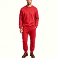 Red fleece tracksuit detail, soft warm fabric, solid crewneck sweatshirt, casual pants. - Red