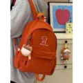 Orange cute cartoon dog backpack for teen girls, casual stylish school bookbag variant. - With Squishy Toy / L / Orange