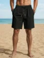 Herren lässige Leinen Strandshorts in Schwarz mit Kordelzug am Bund und dekorativen Knöpfen. - S / Unterteile / Schwarz