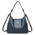 Donkerblauwe zachte lederen schoudertas voor dames, ruime crossbody tas met meerdere vakken. - Blauw
