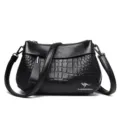 Zwarte schoudertas voor dames van krokodillen kunstleder, stijlvolle vintage crossbody. - Zwart