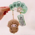 Grazioso portachiavi in peluche pecora marrone con etichetta denaro e confezione. - Pecora Prospera