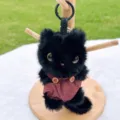 Black plush cat keychain with red-brown overalls, cute fluffy plush bag charm and key ring. - Black Cat