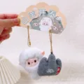 Cute plush sheep keychain set with magnetic design, soft fluffy couple toy bag charm accessory. - Goat