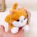 Simpatico peluche di gatto arancione e bianco con zampe magnetiche, morbido animale. - Gatto Arancione