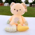 Simpatico gatto di peluche con motivo floreale, morbida bambola per dormire e comodo cuscino. - Giallo