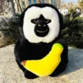 Simpatico peluche scimmia saki dalla faccia bianca con banana bambola morbida cuscino - Scimmia Saki Faccia Bianca - Stile Banana / Altezza circa 25cm