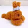 Simatico peluche cane orsetto marrone riccio con fiocco a quadri blu, regalo cuscino - Posizione Prona Con Fascia Per Capelli / 25cm / Arancione