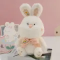 Simpatico coniglietto di peluche morbido animale imbottito con fiocco a quadetti e regalo. - Seduto Piccolo Rosa Altezza 33cm / Versione Originale