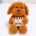 Cute curly teddy dog plush toy sitting with a smile sign, soft brown puppy doll gift. - Sitting Holding Notebook