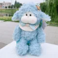 Simpatico peluche agnello riccio blu, morbido pupazzo di animale per dormire e regalo. - Mousse Piccola Pecora Seduta - Blu