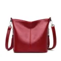 Rode leren emmertas met kwastjes, stijlvolle schoudertas en crossbodytas met grote capaciteit. - Rood